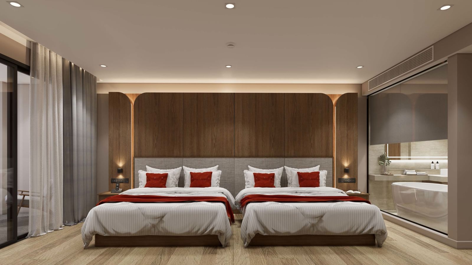 Twin beds in a spacious, warmly lit room at Ramada Resort by Wyndham Khao Lak.