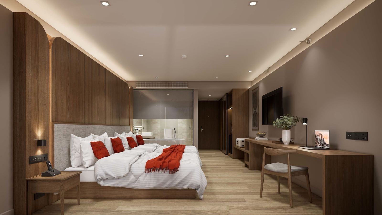 Modern bedroom with king bed, wooden decor, and desk at Ramada Resort by Wyndham Khao Lak.
