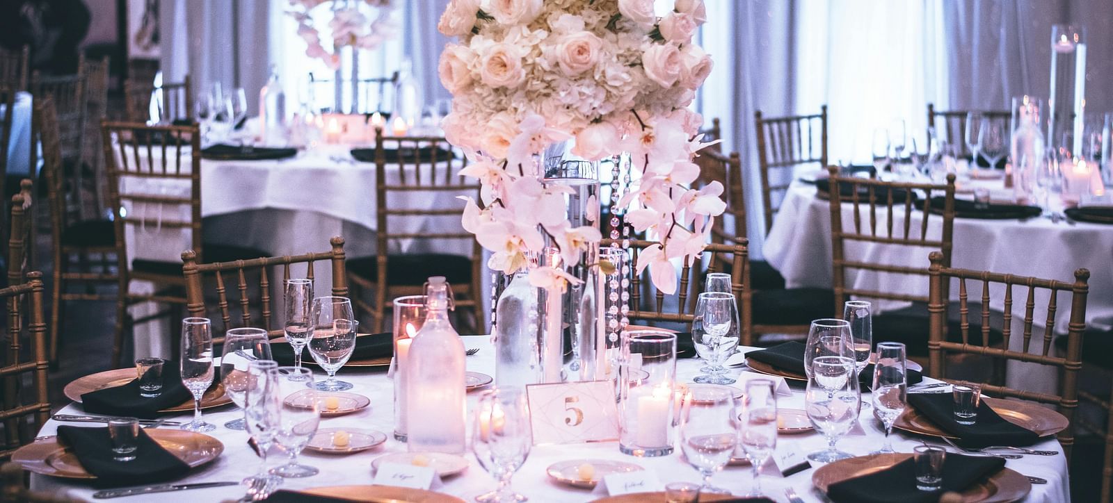 A round table with flowers and utensils |  Mango Hill Central, Chennai