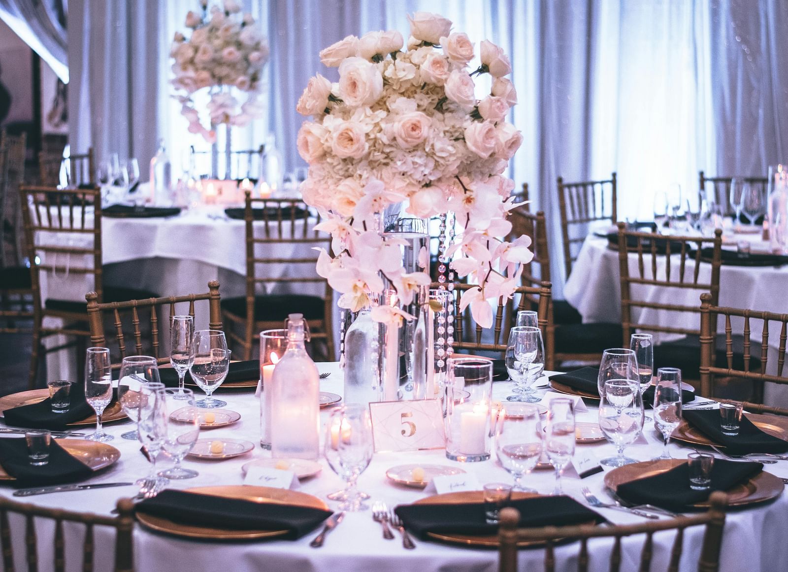 A round table with flowers and utensils |  Mango Hill Central, Chennai