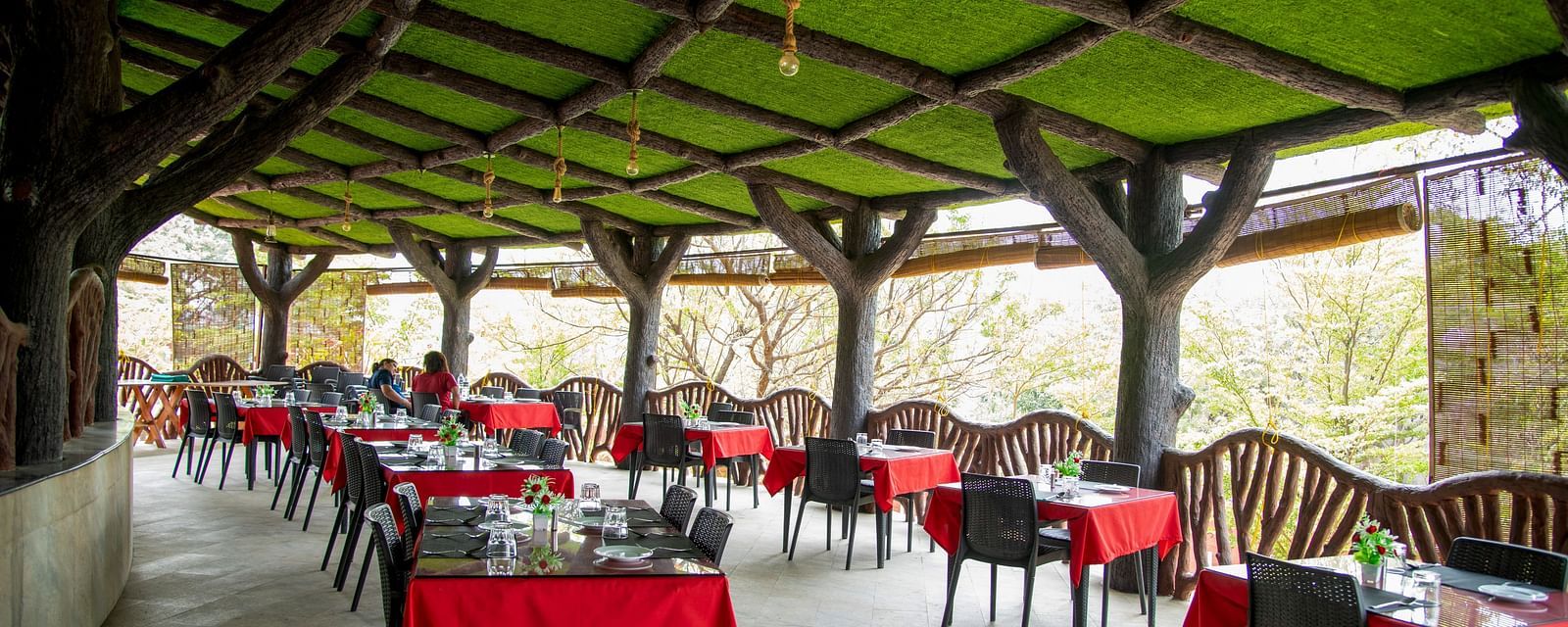 A cafeteria with two seater and four seater dining tables | Diamond Parks, Pune