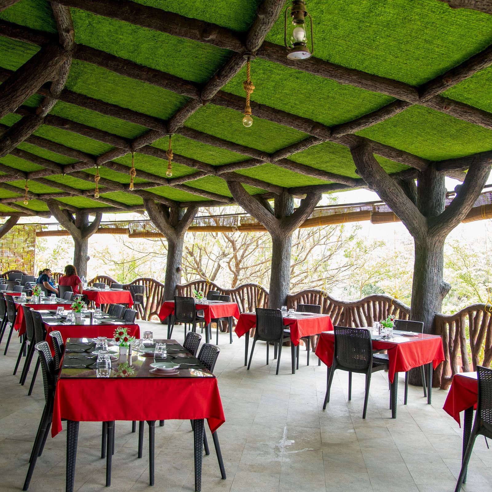 A cafeteria with two seater and four seater dining tables | Diamond Parks, Pune