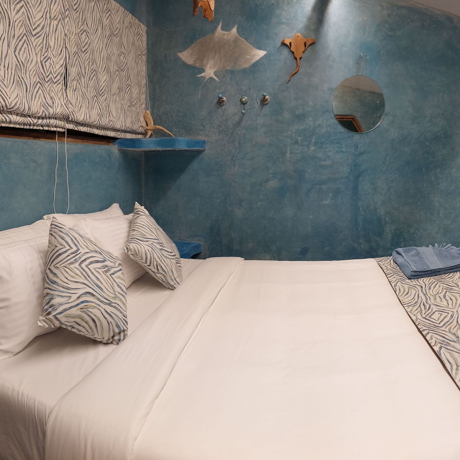A bed with bedding | Matsya Island Retreat