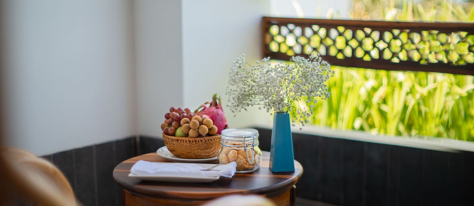 An image of a corner table where eatables are placed - Alibu Resort Nha Thrang