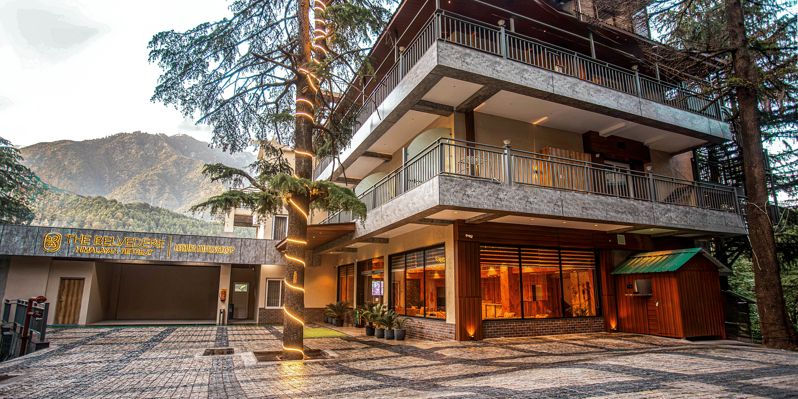 A daytime view of the facade of The Belvedere Himalayan Retreat in McLeodganj.
