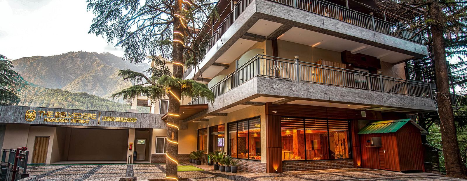 A daytime view of the facade of The Belvedere Himalayan Retreat in McLeodganj.