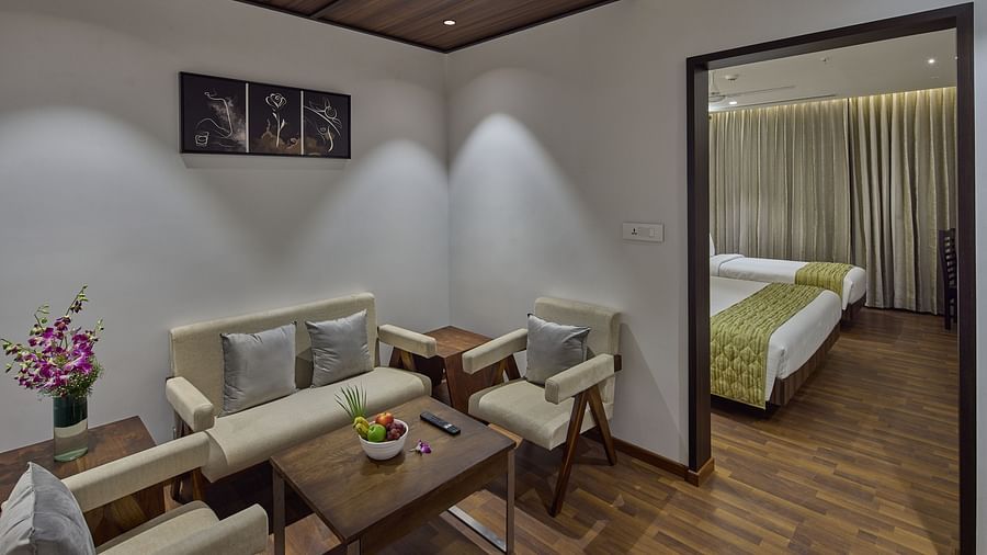 Living area with access to the room in the suite at Grand Continent - A Sarovar Premiere Affiliate Hotel, Hosur
