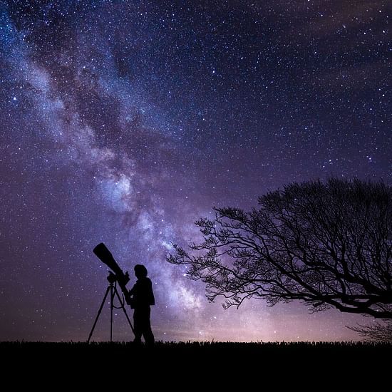 a person stargazing