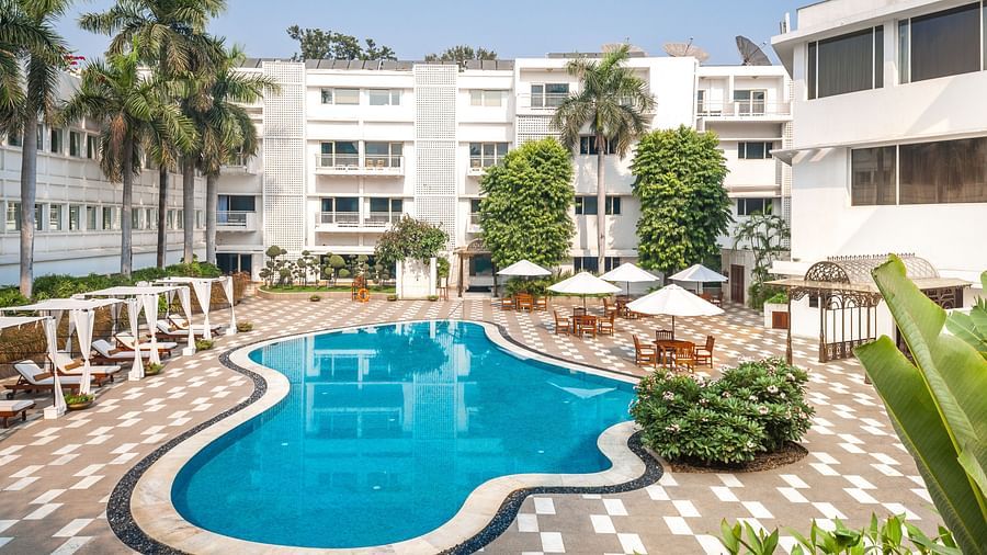 a drone shot of the swimming pool area at The Claridges New Delhi