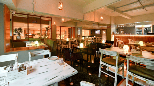 seating arrangements inside MEZZE9 Bar Kitchen - VITS Sharanam, Thane