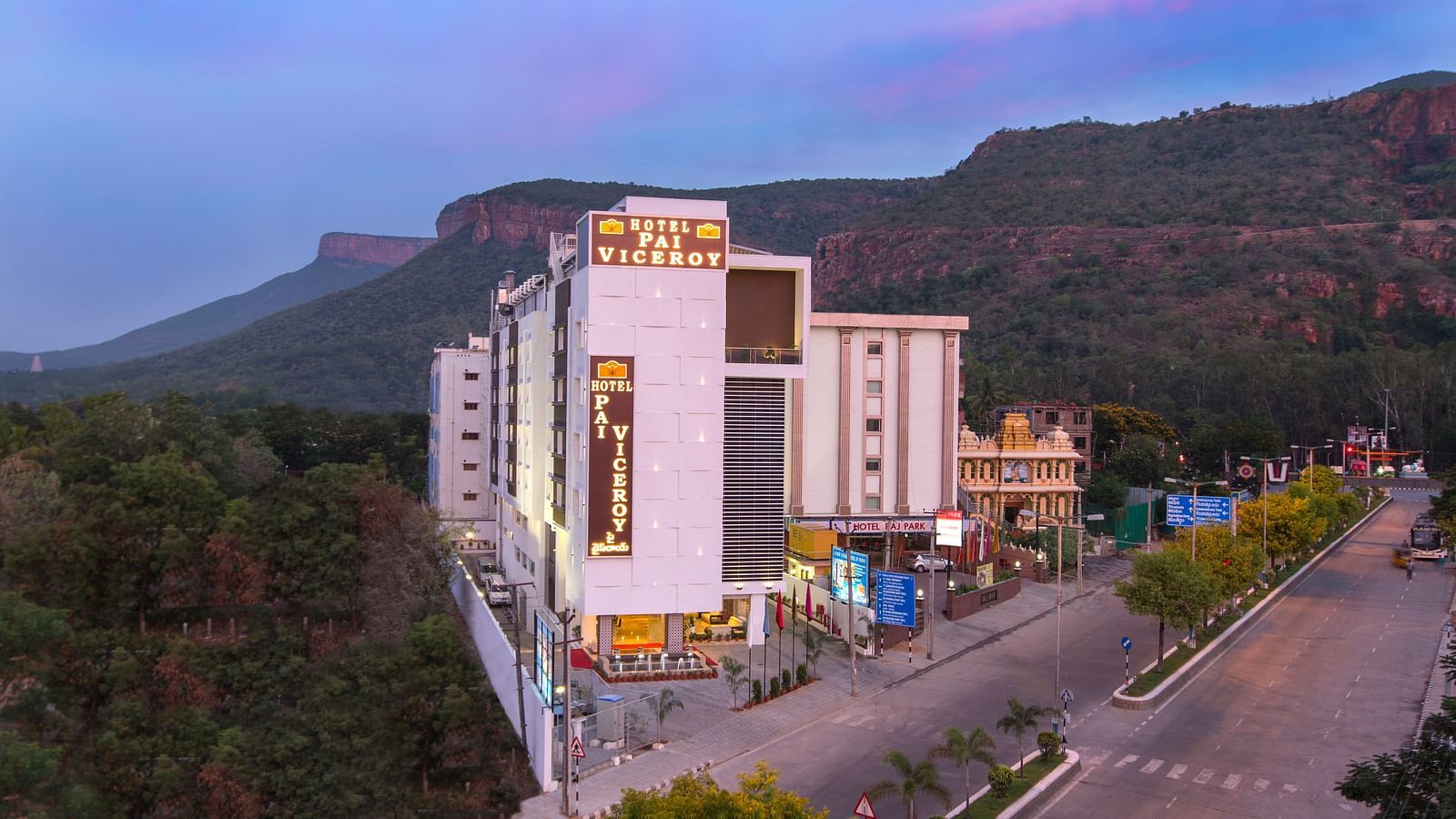 facade image of Hotel Pai Viceroy in Tirupati with the evening sky in the background