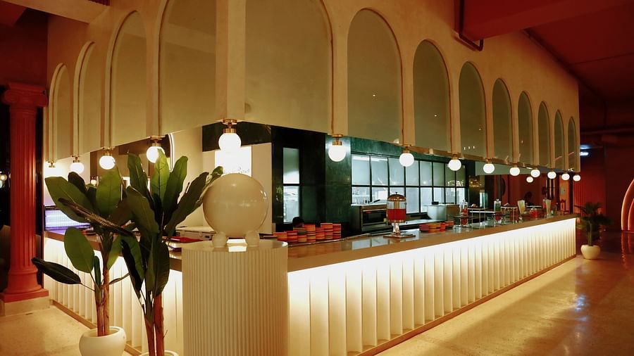 An image of a food court with various food items placed on a table - Themis arbecue House, Ambala