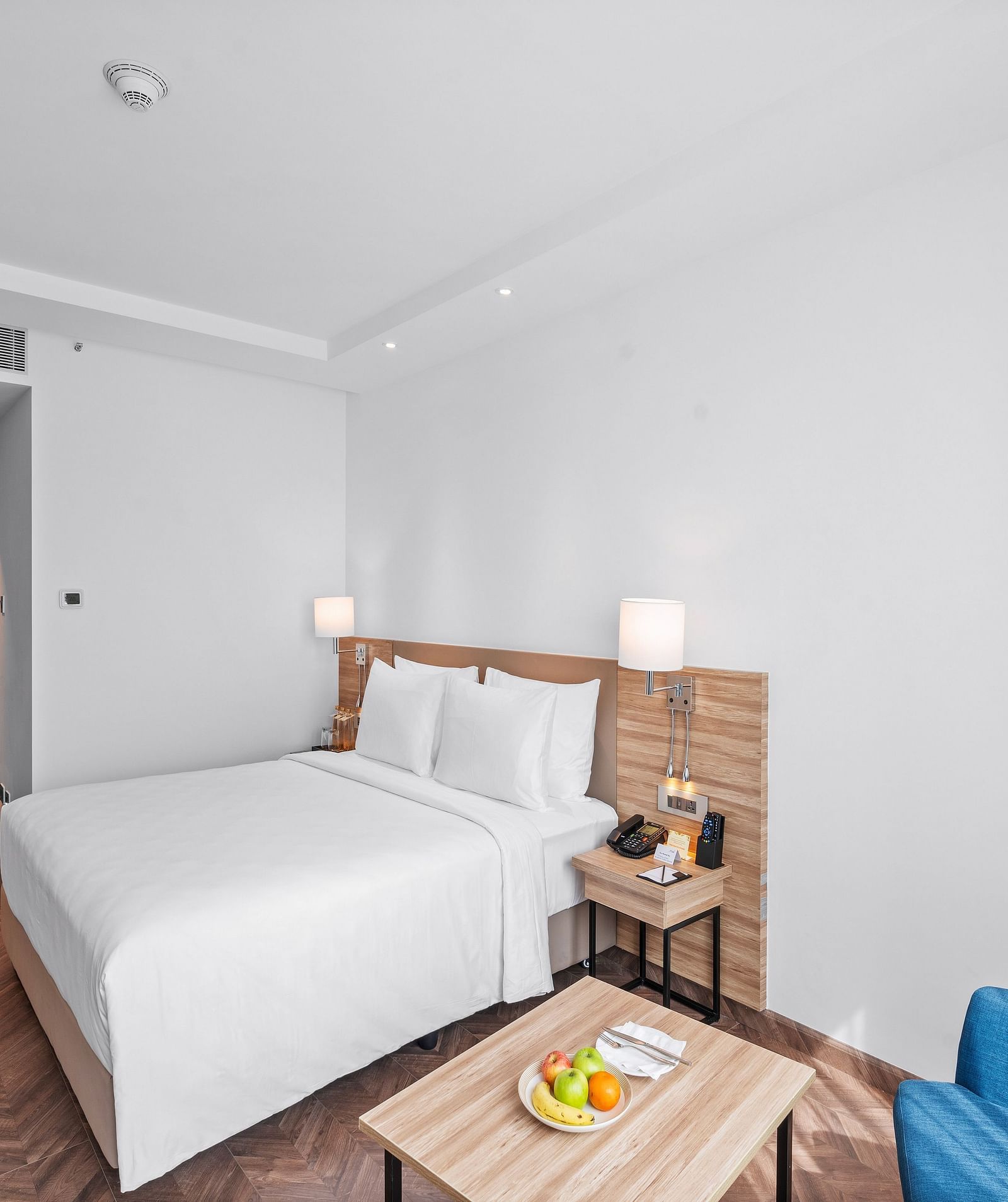 An image of a king size bed of a Grand Club Room at Grand Vijayawada by GRT Hotels.