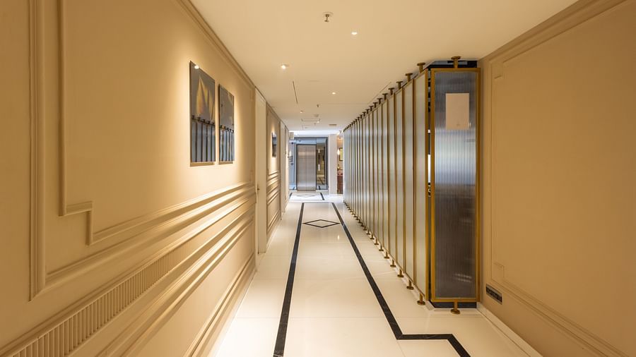 Corridor with beige walls| Renest Calangute, Goa
