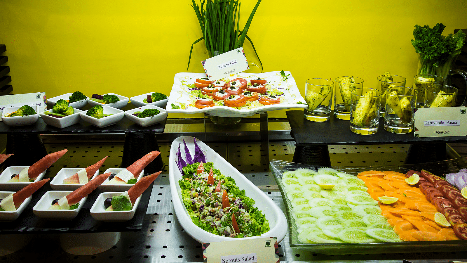 Hotel buffet spread with various salads, dips, and appetizers  | Regency Tirunelveli By GRT Hotels