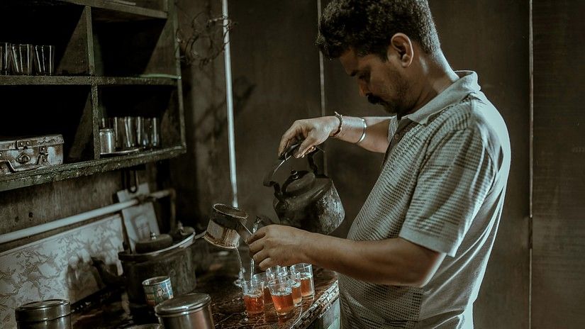 Man serving tea 