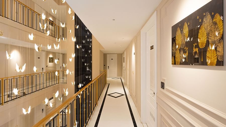 A view of well-lit interiors with golden lights | Renest Calangute, Goa