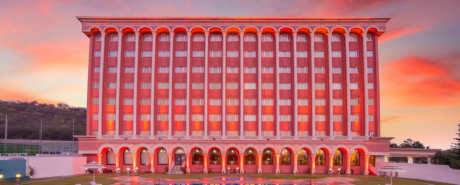 Facade of Sitara Luxury Hotel in Hyderabad near Ramoji Film City during the evening