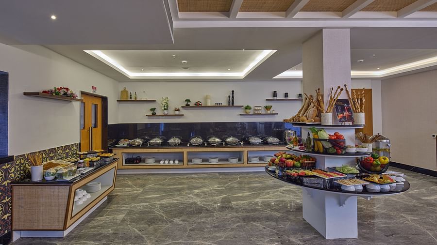 fruits, vegetables and various breads in the buffet stations at Flavours all day dining - Grand Continent, Mahabalipuram