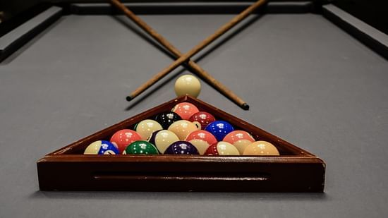 Close view of pool table with balls as well as cute stick - Mastiff Grand - The Sia Palace Suites & Banquets, Khopoli