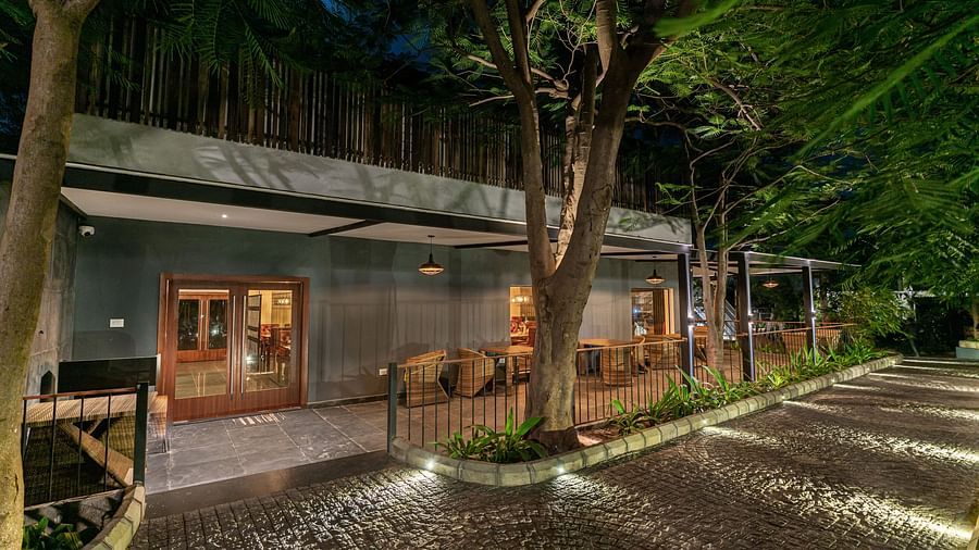 image of the entrance of the mekong restaurant with pathway lights illuminating the pathway - Darza Resorts