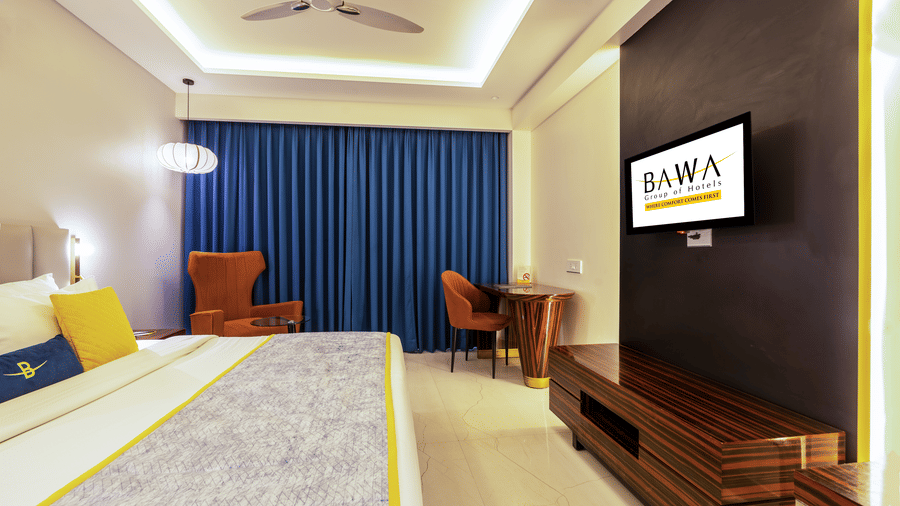 Modern standard bathroom with high-contrast marble walls and a sleek glass walk-in shower.