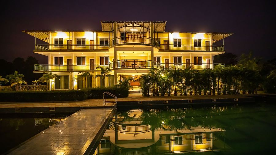 Facade of The Kanila Resort with a swimming pool taken during the night.