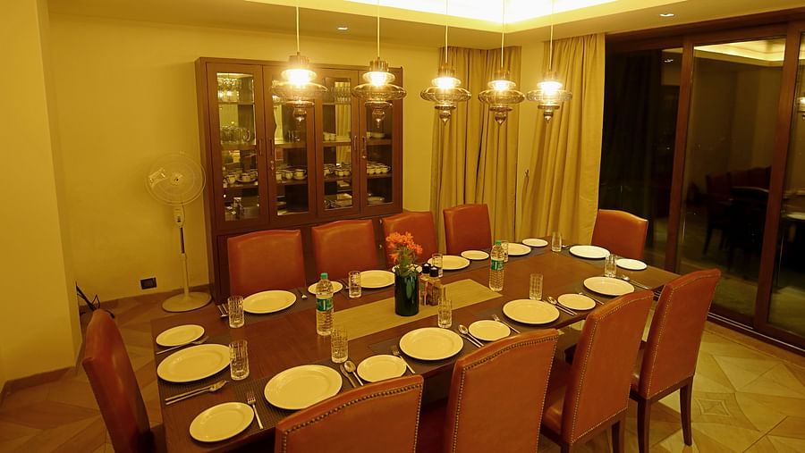 well lit dining area with dining table  - Aranya Himalayan Retreat, Mashobra
