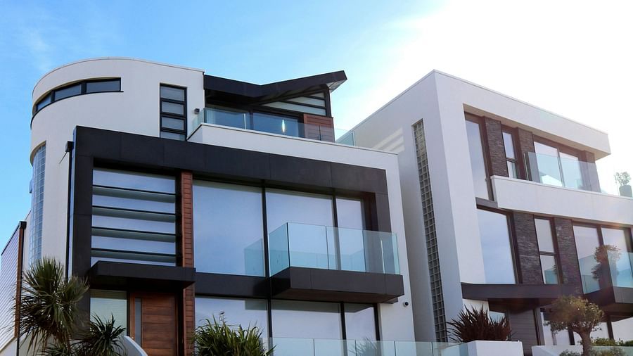 Modern apartment complex with clean, minimalist architecture.