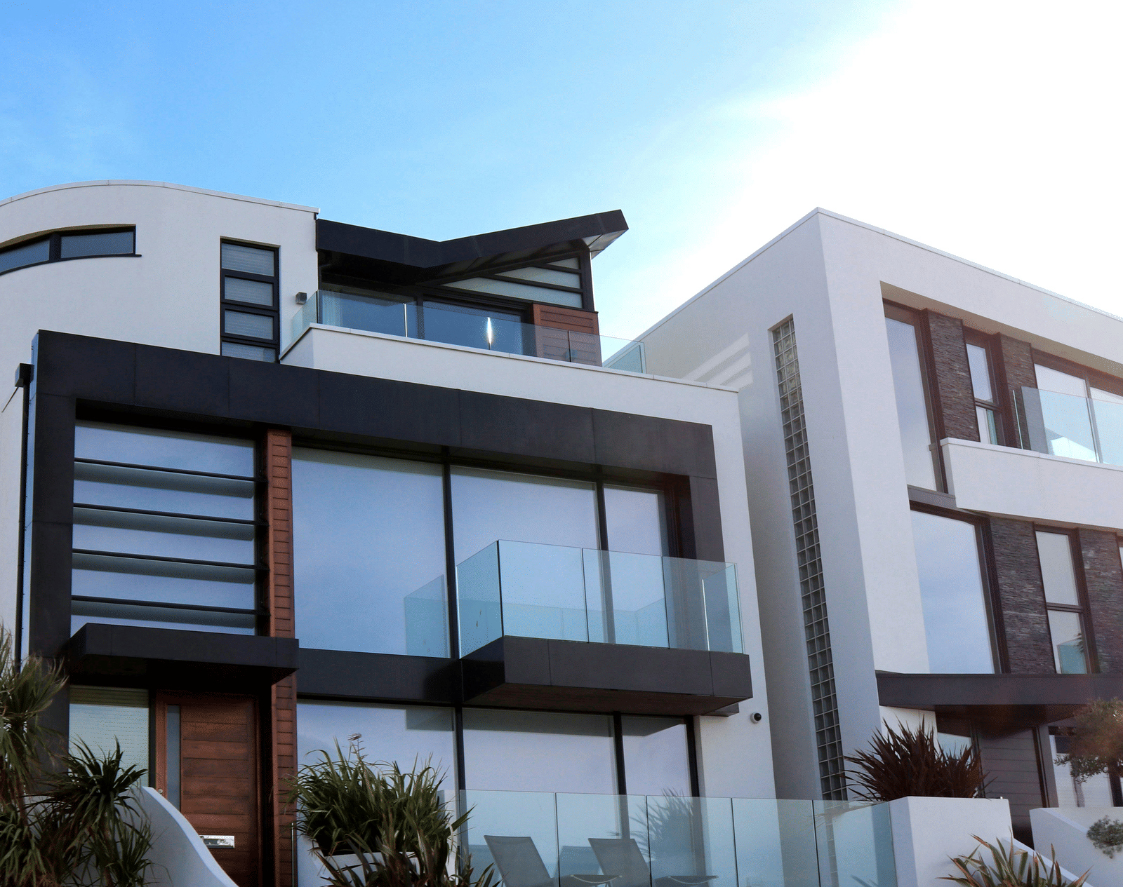 A modern apartment complex with clean, minimalist architecture