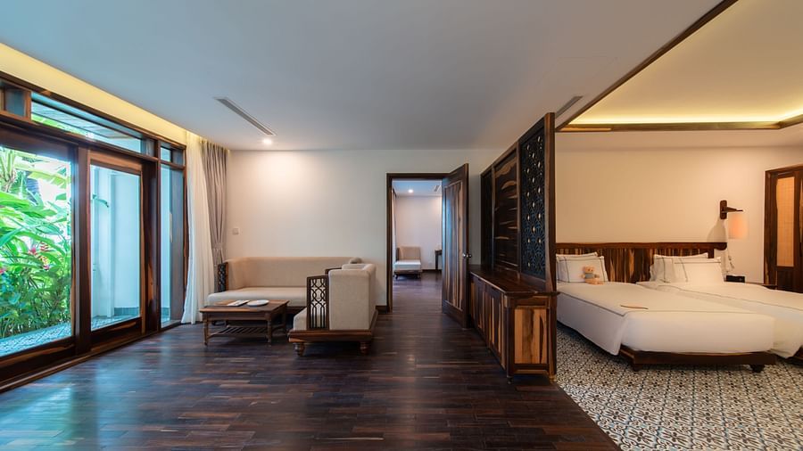 An image of a master suite bedroom with balcony  - Alibu Resort Nha Thrang