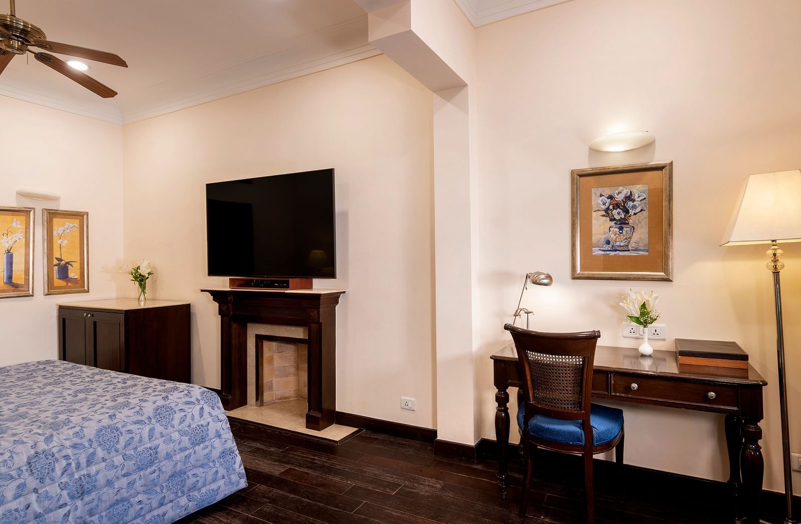 image showing a wall mounted TV along with work desk at the Claridges Room at The Claridges Nabha Residence