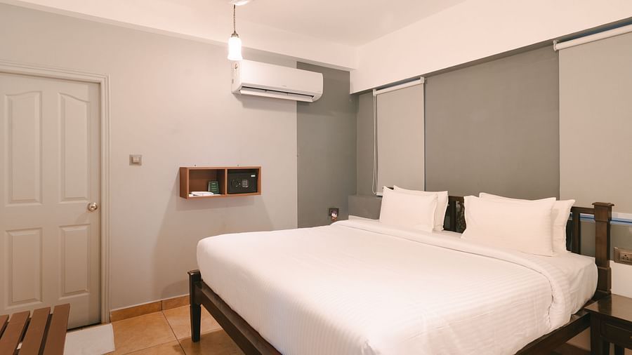 Elegant bedroom with a comfortable double bed and a stylish interior at the Two BHK apartment in Richmonde Ananta Elite, Goa.