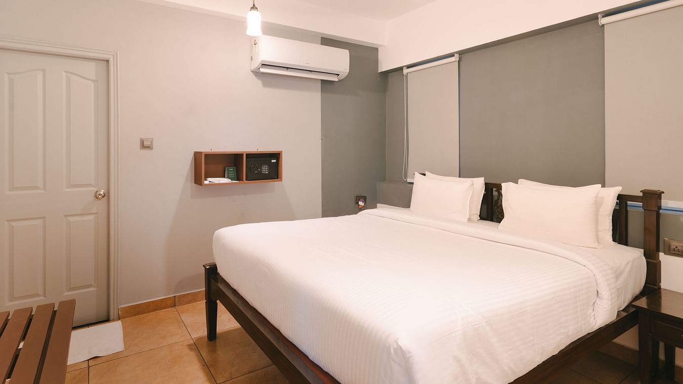 Elegant bedroom with a comfortable double bed and a stylish interior at the Two BHK apartment in Richmonde Ananta Elite, Goa.