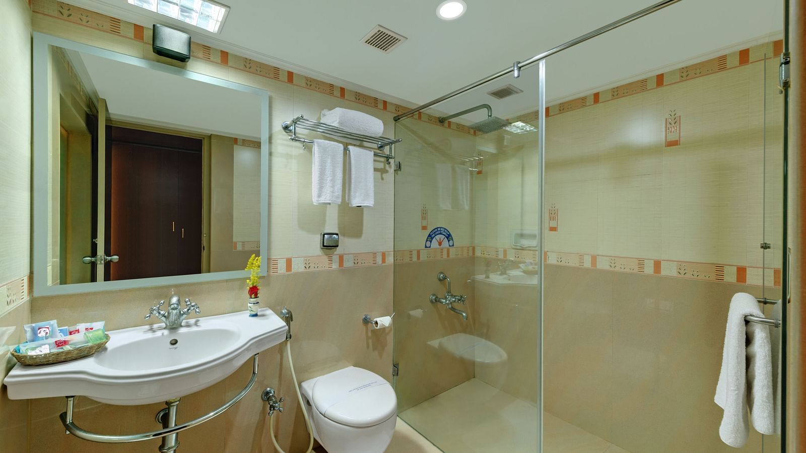 Bathroom with modern amenities  at SRM Hotel Trichy