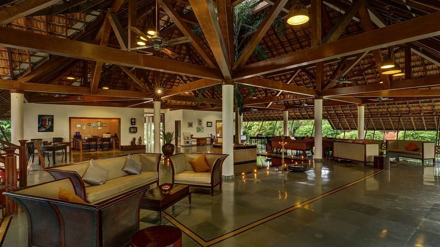 an image of seating arrangements inside the restaurant - Rhythm Kumarakom