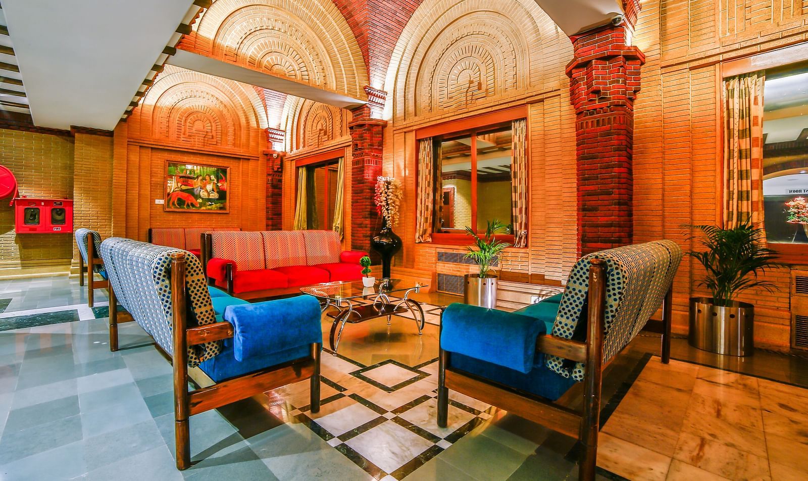 Hollywood decked with blue sofa and table at Tara, Comfort Hotel in Hyderabad - Ramoji Film City.