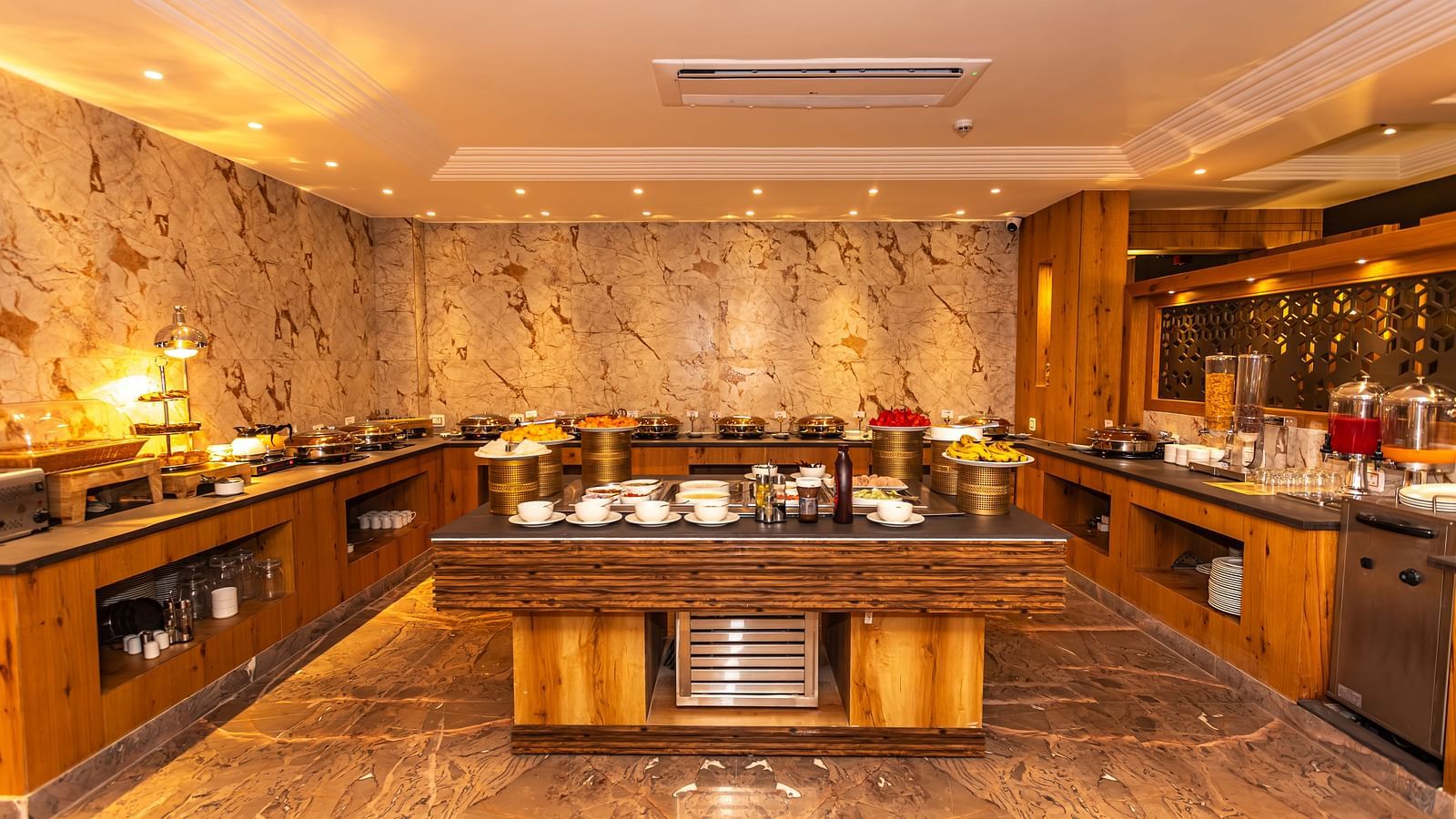 An image of the buffet served at The Belvedere Himalayan Retreat, McLeodganj where tables are laid out with different delicacies and cutlery