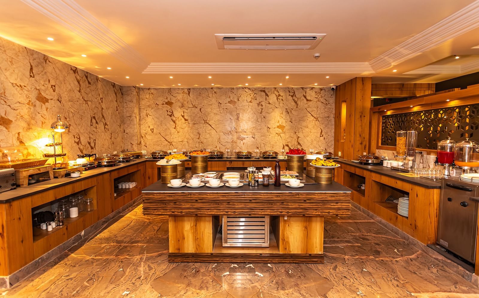 An image of the buffet served at The Belvedere Himalayan Retreat, McLeodganj where tables are laid out with different delicacies and cutlery
