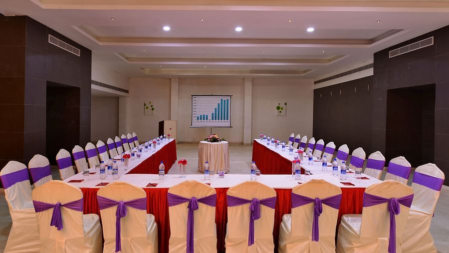 Aravali banquet hall with chairs and tables arranged in board room setting