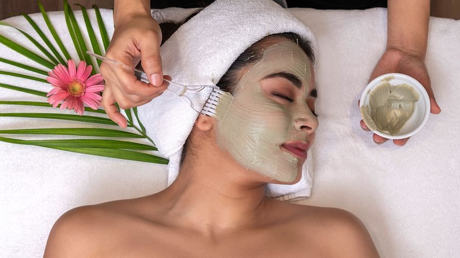 A woman enjoying a face pack treatment provided at Cinqtuair Spa in New Delhi