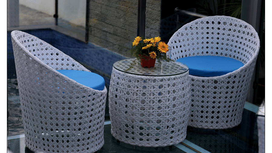 blue and white themed restaurant dining area of Lily restaurant offering outdoor dining experience - Royal Lotus View Resotel2