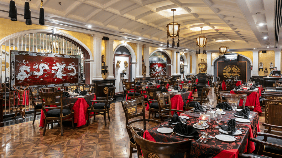Elegantly decorated Chinese restaurant interior at Mayfair Lagoon with red furnishings and ornate ceiling