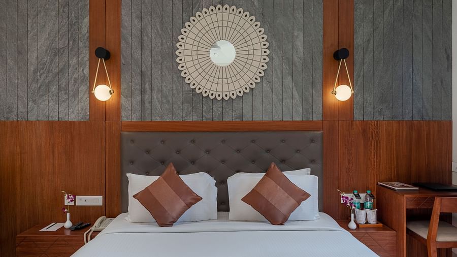 view of a king size bed of a Superior Room at Stone Wood Hotel, Kumbhalgarh