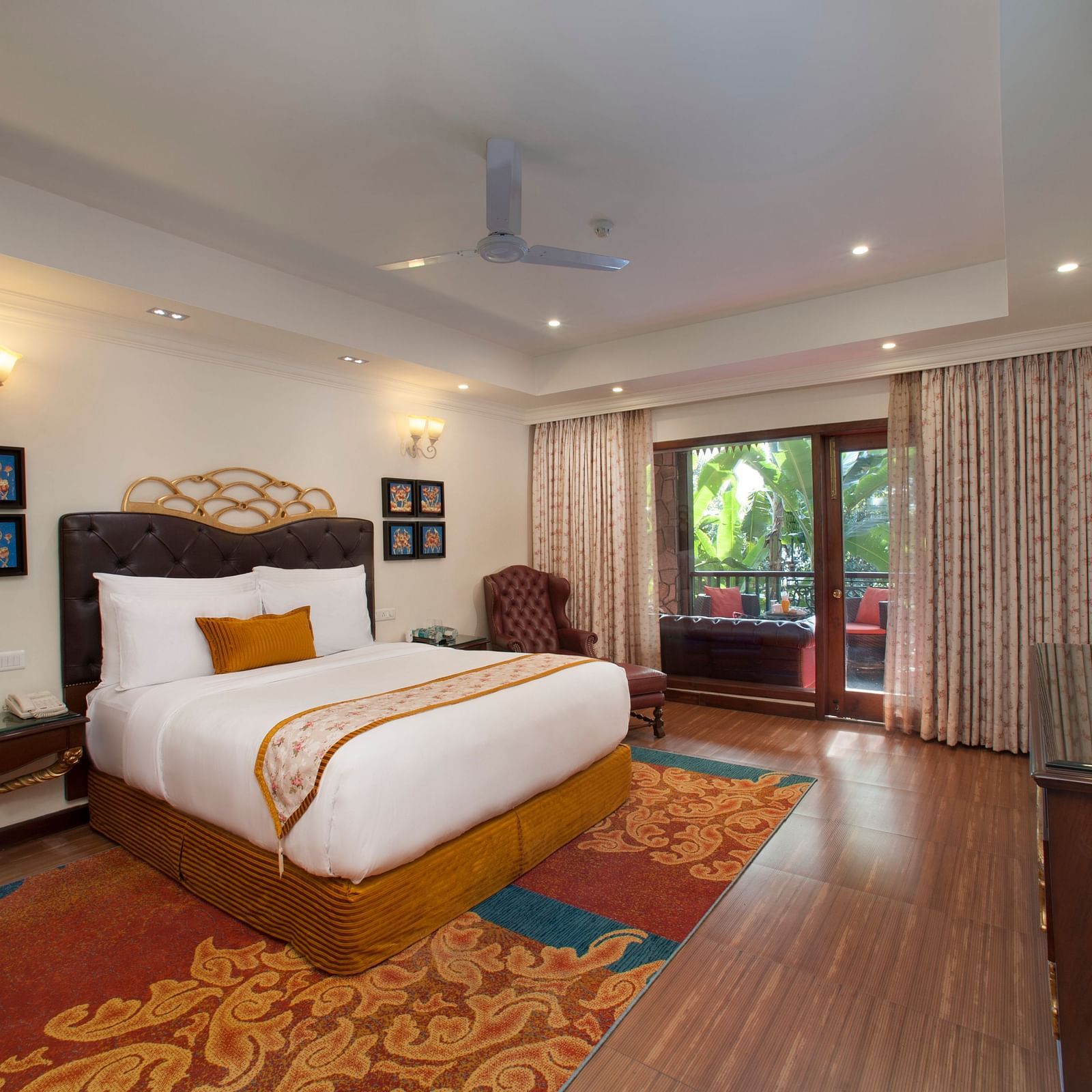 a king size bed facing the TV - Mayfair Spa Resort & Casino Gangtok 1