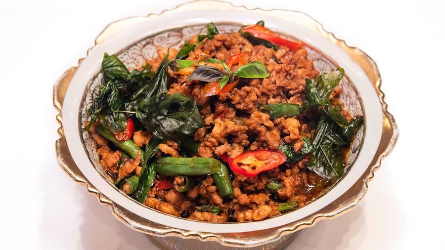 image of a dish popularly known as the gapraw which is a spicy preparation of thai basil curry - The Claridges New Delhi