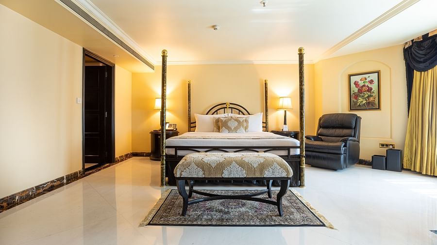 presidential suite with a commodious bed and elegant interiors - The Orchid Hotel Mumbai Vile Parle