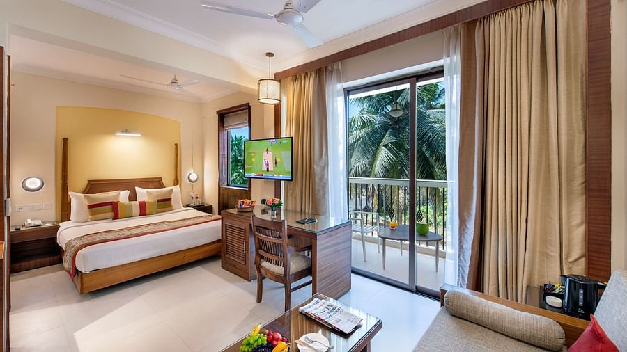 interior of one of our room with balcony in goa