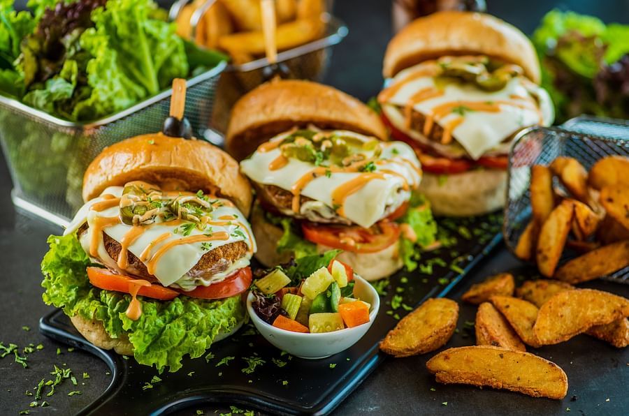 three mini burgers with potato wedges - polo floatel kolkata