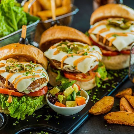 three mini burgers with potato wedges - polo floatel kolkata